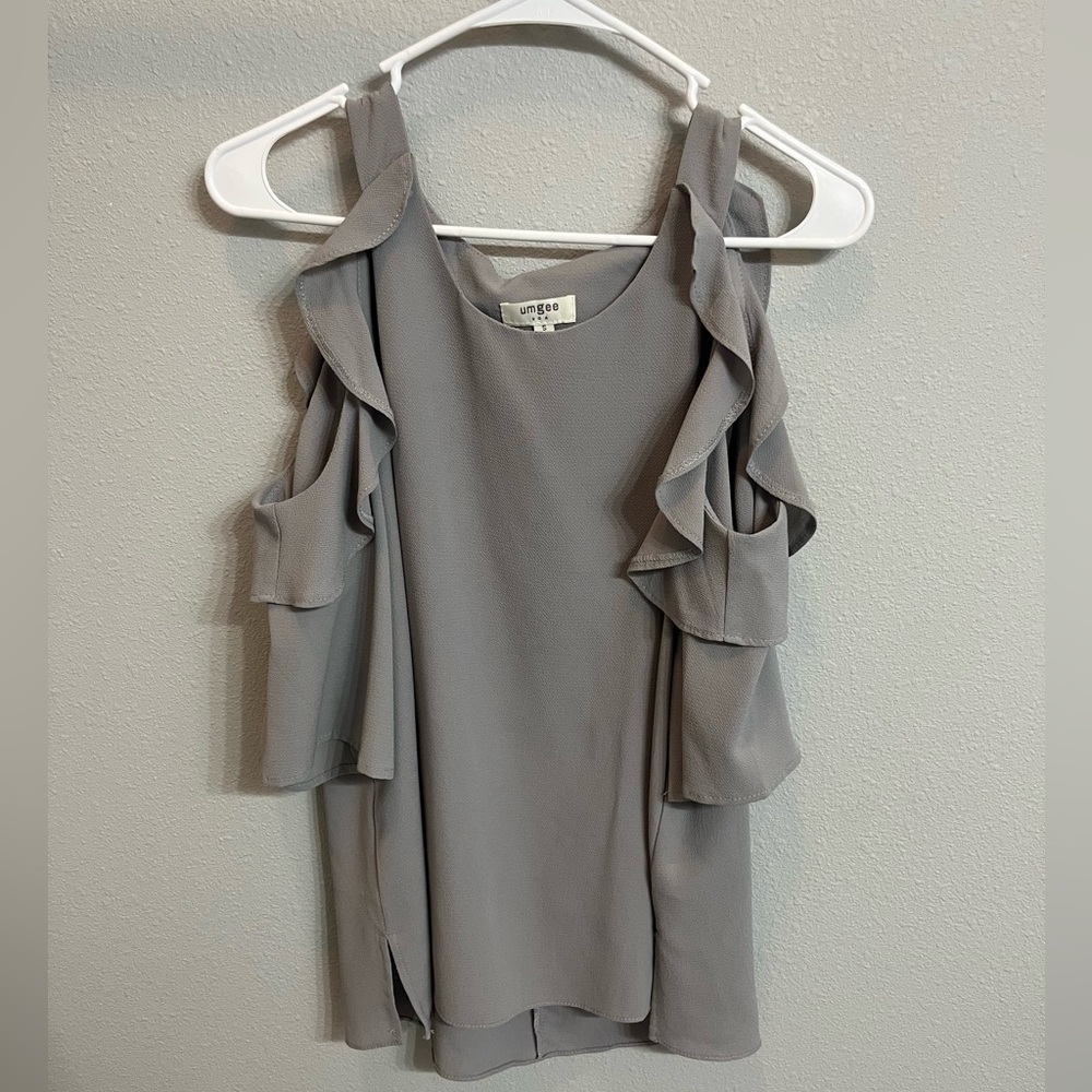 SUPER CUTE Grey ruffle detailed shirt. Cut out shoulders!